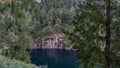 An amazing emerald lake in the crater of an extinct volcano.