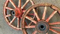 Amazing engineering: 19th century wheels perfectly balanced stand upright although the wheel hubs have different geometries Royalty Free Stock Photo