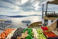 Amazing evening view of Fira, caldera, volcano of Santorini, Greece with cruise ships at sunset. Royalty Free Stock Photo