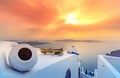 Amazing evening view of Fira, caldera, volcano of Santorini, Greece with cruise ships at sunset. Cloudy dramatic sky Royalty Free Stock Photo