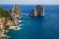 Amazing Faraglioni cliffs panorama with the majestic Tyrrhenian sea in background Capri island Campania region Italy Royalty Free Stock Photo