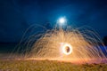 Amazing Fire dancing Steel Wool Photography Royalty Free Stock Photo