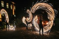 Amazing fire show at night at festival or wedding party. Fire da