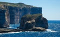 Fungus and Gebla Rock cliffs near Azure window, Gozo island, Malta Royalty Free Stock Photo