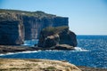 Fungus and Gebla Rock cliffs near Azure window, Gozo island, Malta Royalty Free Stock Photo