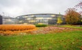 Amazing garden in nature style close to main office of company BAYER in Leverkusen at autumn : pond and orange foliage