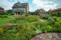 Amazing garden with perennials and country house in russian prosperous village