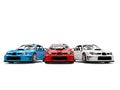 Amazing GT race cars in red, white and blue Royalty Free Stock Photo