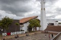 Amazing guatavita shot. A Colombian town main square with `i love guatavita` lettering main church and clock tower