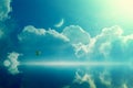 Amazing heavenly image - crescent and hot air balloon rising above serene sea, light from heaven Royalty Free Stock Photo