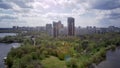 Amazing high angle top drone view on Strogino and Shchukinodistrict which are situated in beautiful green river park.