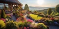 Amazing home garden at sunset in summer, upscale landscaped house backyard. Scenic view of stones, flowers, sky and green plants. Royalty Free Stock Photo