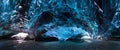 Amazing ice cave. Blue crystal ice cave and an underground river beneath the glacier. Amazing nature of Skaftafell. Royalty Free Stock Photo