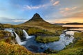Amazing Icelandic landscape at the top of Kirkjufellsfoss waterfall with Kirkjufell mountain in the background