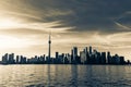 Amazing inviting natural landscape view of Toronto skyline, downtown area on dark golden sunset time background