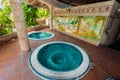 Amazing inviting view of outdoor spa room with hydro massage Jacuzzi