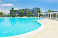 amazing inviting view of swimming pool, tranquil turquoise clear water, sunny gorgeous day at Grand Aston hotel