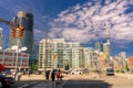 Amazing, inviting view of Toronto down town area with modern stylish buildings, cars bus and people walking through the streets Royalty Free Stock Photo