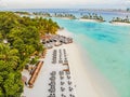 Amazing island in the Maldives ,Beautiful turquoise waters and white sandy beach with blue sky background