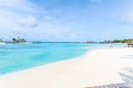 Amazing island in the Maldives ,Beautiful turquoise waters and white sandy beach with blue sky background for holiday vacation Royalty Free Stock Photo