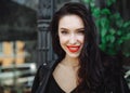 Amazing joyful pretty girl with long brunette hair wearing in leather jacket. Close up fashion portrait of pretty Royalty Free Stock Photo