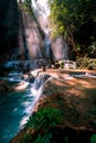 Amazing Kuang Si Falls in Luang Prabang, Laos. Perfect blue water combined with beautiful sunlight and powerful green colors.