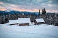 Amazing landscape with abandoned cabins in winter Carpathian mountains Royalty Free Stock Photo