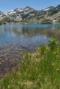 Amazing landscape of Demirkapiyski chuki and Dzhano peaks, Popovo lake, Pirin Mountain Royalty Free Stock Photo