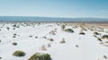 Amazing landscape with gypsum dunes in the middle of the desert with shades in the white and green sand of the little vegetation Royalty Free Stock Photo