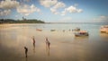 Amazing landscape, isolated boat in the sea, in Ilha de Mare, Salvador, Brazil. People in the beach