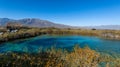 Amazing landscape with a lake and river in the middle of the desert with shades in the water of blue and turquoise green Royalty Free Stock Photo