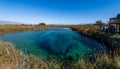 Amazing landscape with a lake and river in the middle of the desert with shades in the water of blue and turquoise green Royalty Free Stock Photo