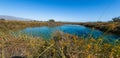 Amazing landscape with a lake and river in the middle of the desert with shades in the water of blue and turquoise green Royalty Free Stock Photo