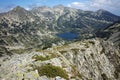 Amazing landscape of Popovo lake and Polezhan peak, view form Dzhano peak, Pirin Mountain Royalty Free Stock Photo