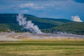 Amazing landscape of small geysers, hot springs, and vents. The boardwalk among pools. Porcelain Basin of Norris Geyser Royalty Free Stock Photo