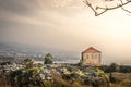 Amazing landscape view of Byblos, traditional house, rocks, palms trees, mountains in the background. Haze warm light in Lebanon