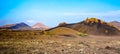 Amazing landscape of volcano craters in Timanfaya national park. Popular touristic attraction in Lanzarote island, Canary islans,