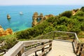 Amazing landscape with wooden staircase to Praia do Camilo beach near Lagos, Algarve, Portugal Royalty Free Stock Photo