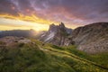 Amazing landscapes view of green mountain with gold sky on sunrise morning from Dolomites, Italy. Royalty Free Stock Photo