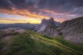 Amazing landscapes view of green mountain with gold sky on sunrise morning from Dolomites, Italy. Royalty Free Stock Photo