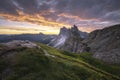 Amazing landscapes view of green mountain with gold sky on sunrise morning from Dolomites, Italy. Royalty Free Stock Photo