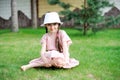 Amazing little girl in pink dress and white hat Royalty Free Stock Photo