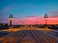 Amazing low angle view of the Bordeaux Stone Bridge and amazing sunset sky over the Bordeaux city, France.