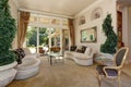 Amazing Luxury entrance Hallway interior with decorative trees in pots. Royalty Free Stock Photo