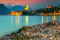 Amazing Malcesine tourist resort and colorful sunset, Garda lake, Italy Royalty Free Stock Photo