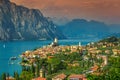 Amazing Malcesine tourist resort and high mountains, Garda lake, Italy Royalty Free Stock Photo