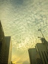 Amazing mammatus clouds over Bangkok, Thailand, with tall buildings foreground. Royalty Free Stock Photo