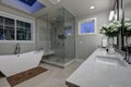 Amazing master bathroom with large glass walk-in shower Royalty Free Stock Photo