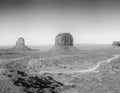 Amazing Monument Valley landscape at sunset with blue summer sky, panoramic view in black and white - USA Royalty Free Stock Photo