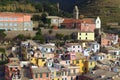 Amazing morning aerial view of Vernazza village. Ancient colorful buildings between mountains and the sea